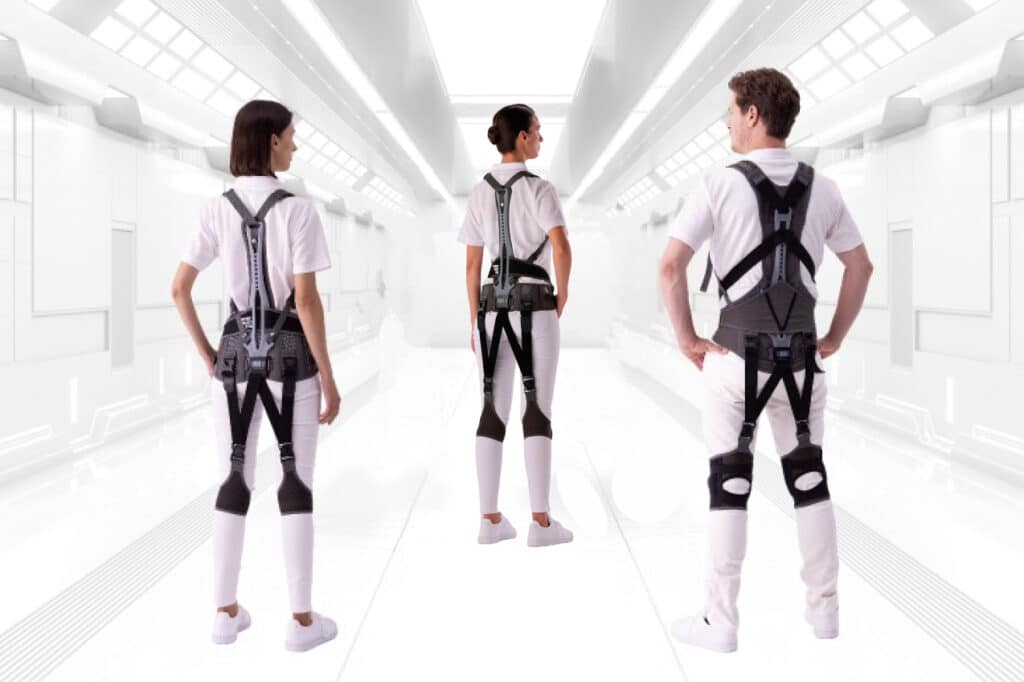 Three people wearing support jackets