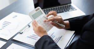a man calculating his import tax