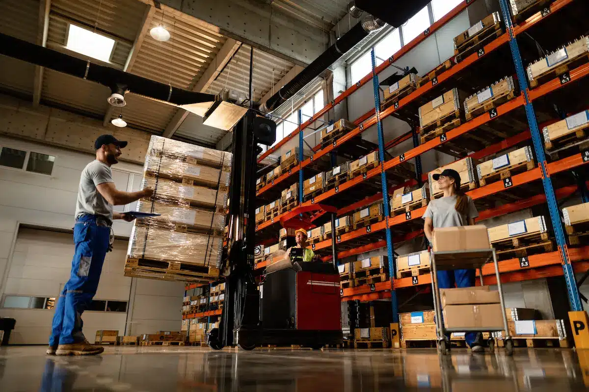 two warehouse workers working